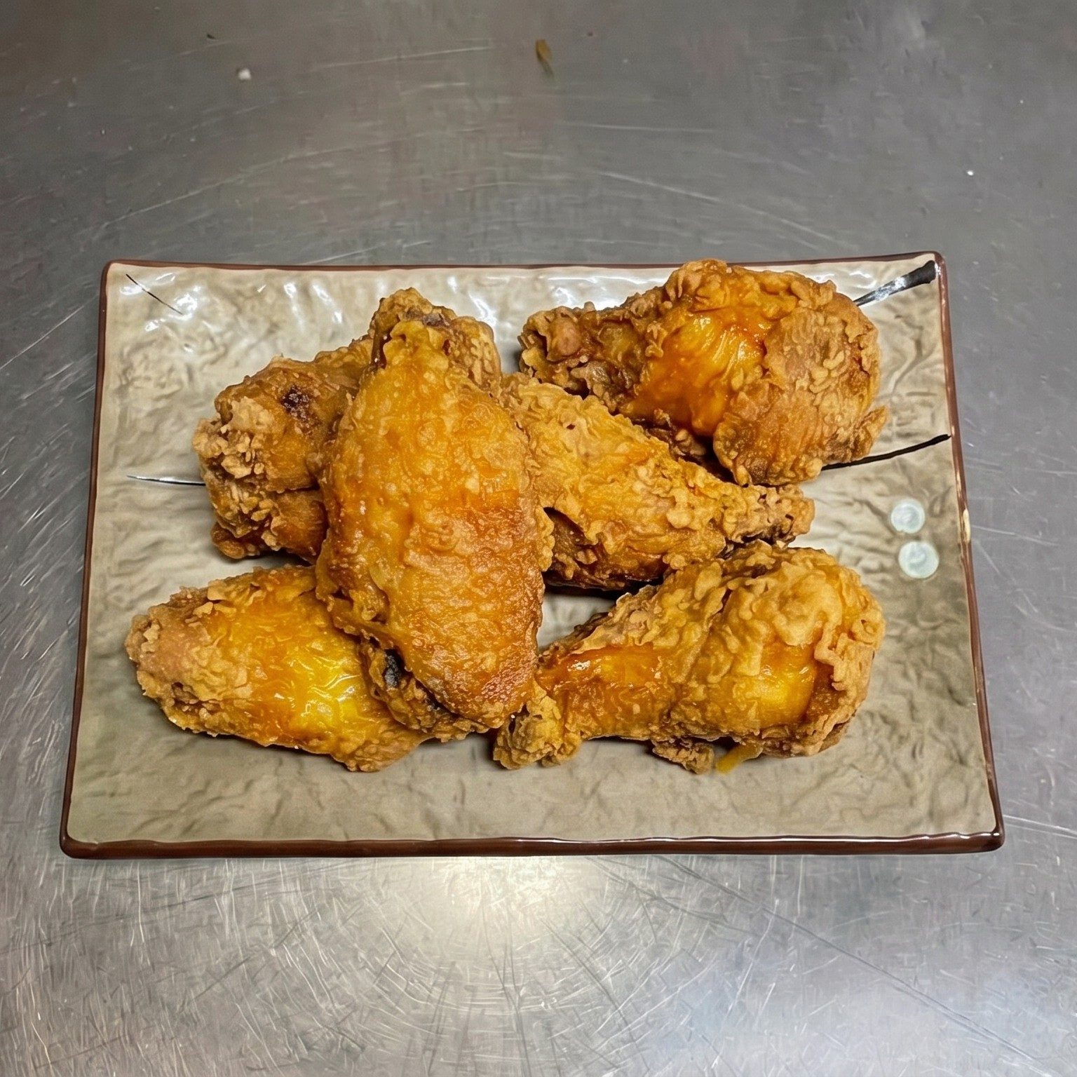H5. Chicken Wing with Honey Sauce.